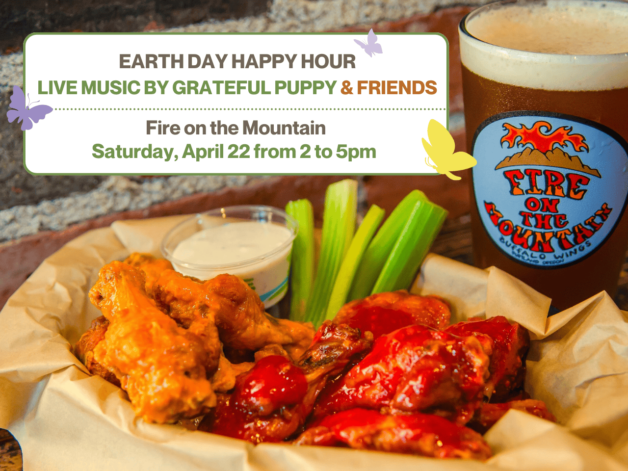 A basket of chicken wings covered in hot sauce with celery sticking out. Behind it is a pint glassed filled with amber liquid that had the Fire on the Mountain logo in blue. There is a white box in the left corner with this text: Earth Day Happy Hour, Live Music by Grateful Puppy & Friends. Fire on the Mountain Saturday April 22 from 2 to 5 pm.